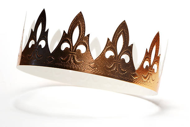 Golden crown Golden crown made of cardboard from Epiphany cake. gold paper crown stock pictures, royalty-free photos & images