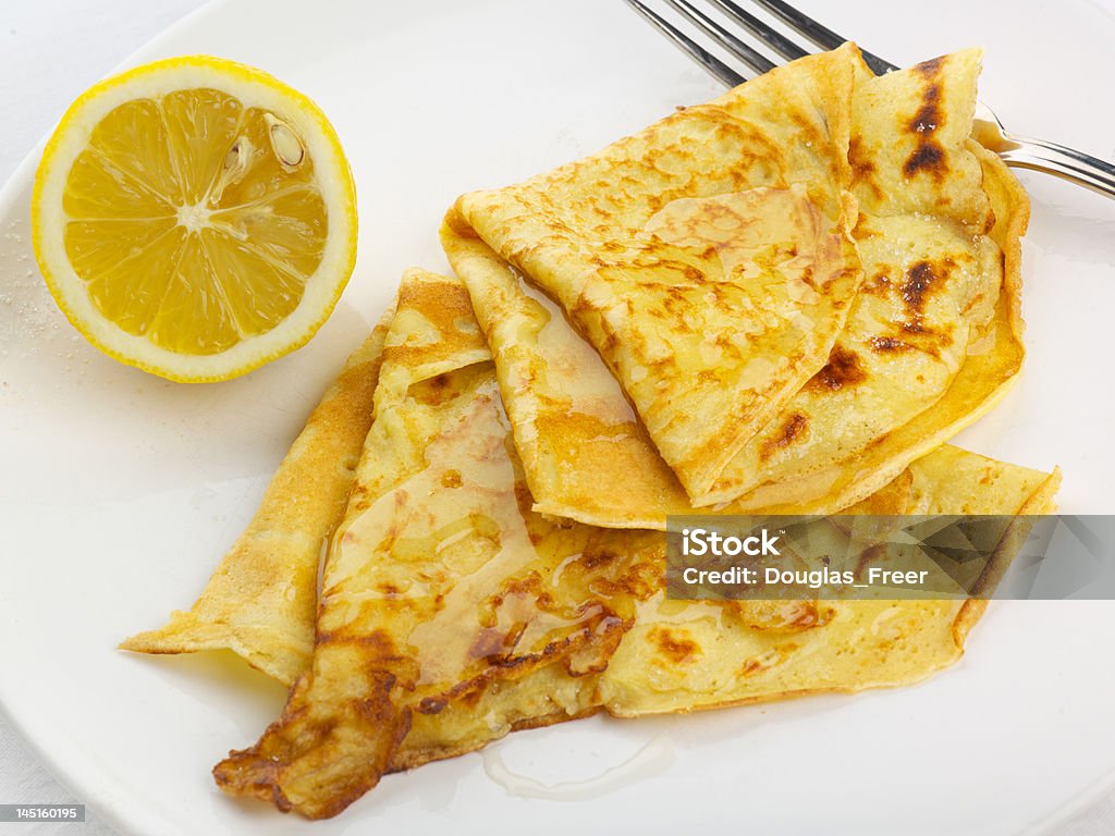 Pancakes Pancakes with sugar, honey and lemon Crêpe - Pancake Stock Photo