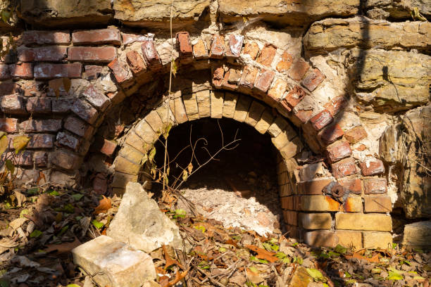 Abandoned ruins of old brick kilns at Pecumsaugan Creek and The Blackball Mines Nature Preserve in North Utica, Illinois.