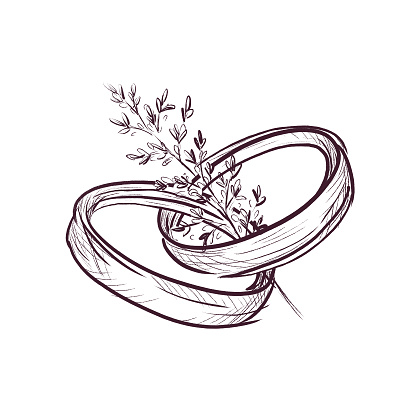 A pair of wedding rings with a branch, leave in vintage style. Wedding accessory for the bride and groom, hand drawing