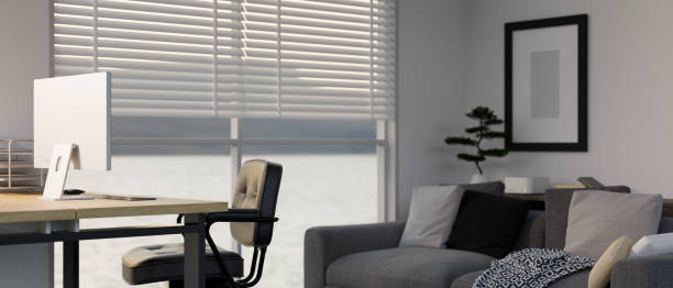 istock Modern private office or home office interior design with computer desk, office chair, sofa 1451612141