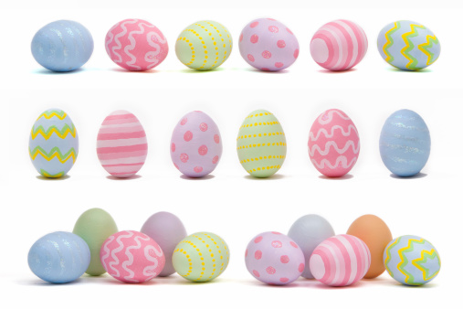 Four Easter egg blue and purple pastel color background.