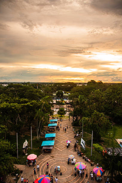 Sunset in Leticia, Amazonas city of Colombia. Park Santander, jungle and Amazon river