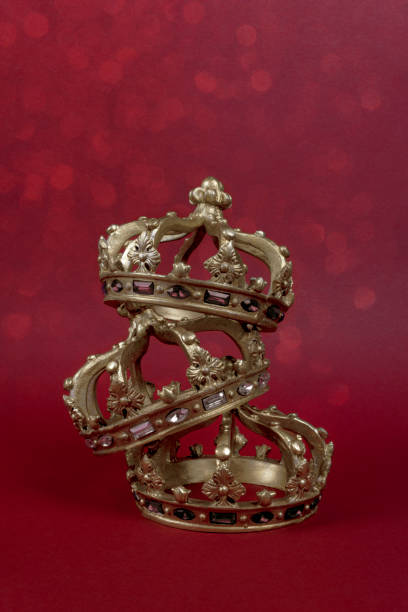istock Happy Three King's Day. Three gold crowns on red background. Concept for Reyes Magos, Three Wise Men or Happy Epiphany day. 1451614957
