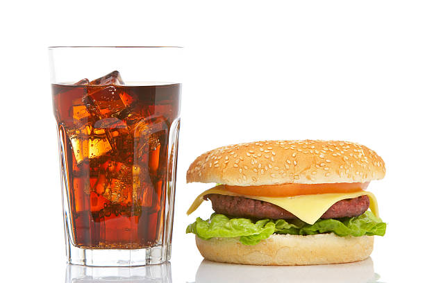 istock Cheeseburger and soda glass 145161884
