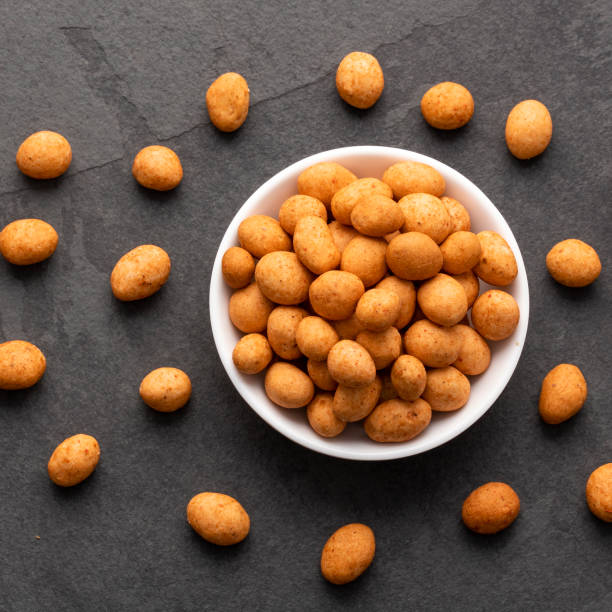 istock Organic Japanese peanuts in the bowl - Arachis hypogaea 1451618920