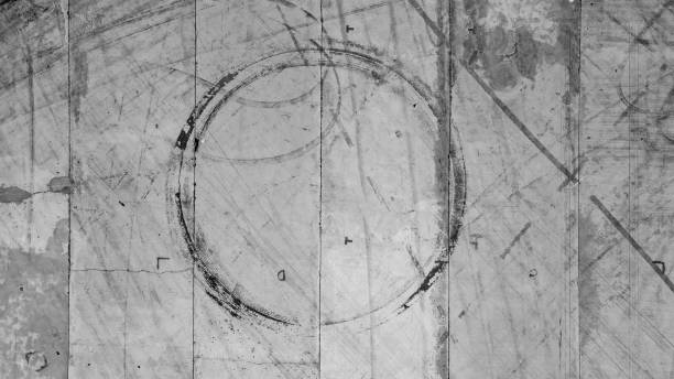 istock Tire tracks texture and background, Asphalt texture with line and tire marks, Automobile automotive tire skid mark on race track, Abstract texture car drift tire skid mark. 1451619608