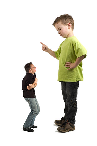 Wo Is The Boss 1? Caricature of a large son pointing his finger at the extra small dad. Not always do the parents tell what must be done! Distracted stock pictures, royalty-free photos & images