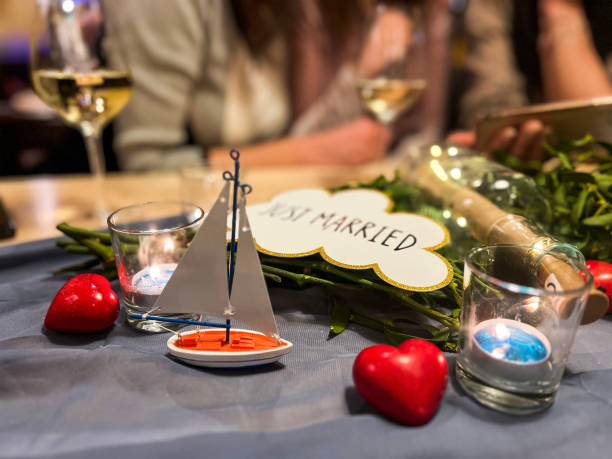 Sailing boat and hearts just married table decor detail