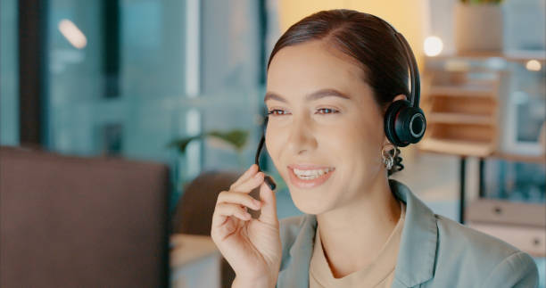 istock Happy consultant, call center or woman for customer support, contact us or working on computer in office. Sales advisor, customer service or girl with smile for support, tech help or telemarketing 1451631942