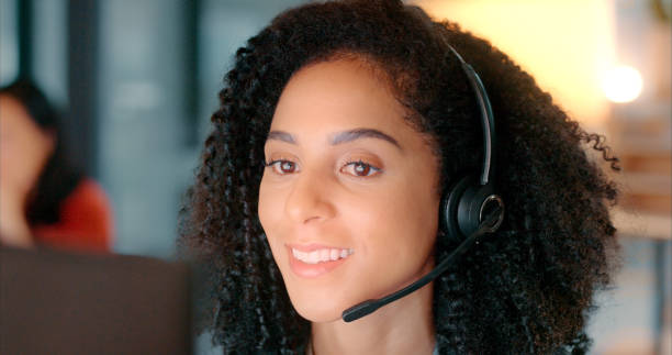 istock Call center, black woman and customer support agent for e commerce, website IT solution and problem solving advisor on computer. Hello, telecom and virtual assistant with sales pitch or business talk 1451631955