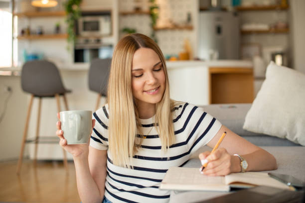 istock Young woman working from home 1451639152