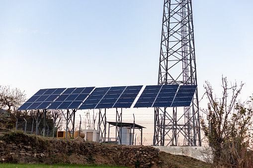 A cellular tower in the remote area powered by the solar panels