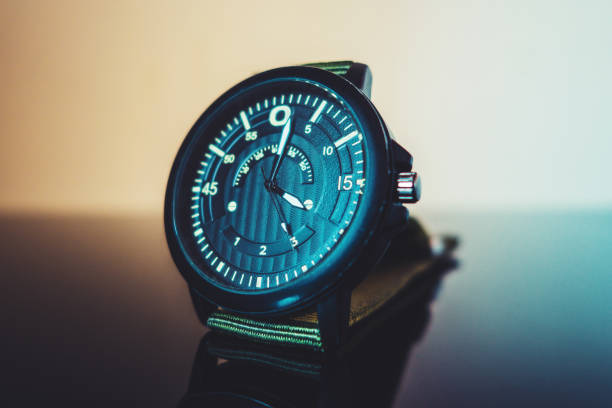 istock close-up of a watch on a reflective surface 1451639318