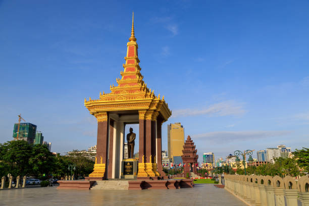 Phnom Penh, Cambodia - November 29, 2022: Independence Monument and Norodom Sihanouk Statue cityscape skyline in Phnom Penh, Cambodia.