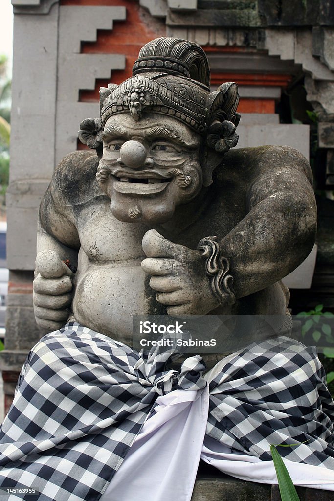 Tutore Statua di pietra in Ubud, Bali - Foto stock royalty-free di Antico - Condizione