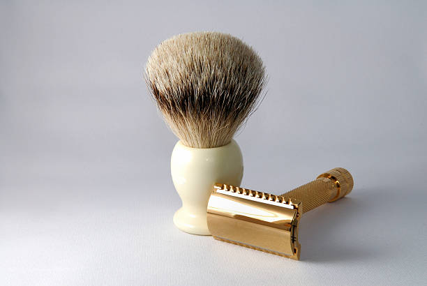 Badger shaving brush with razor stock photo