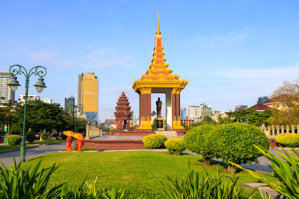 Phnom Penh, Cambodia - November 29, 2022: Independence Monument and Norodom Sihanouk Statue cityscape skyline in Phnom Penh, Cambodia.