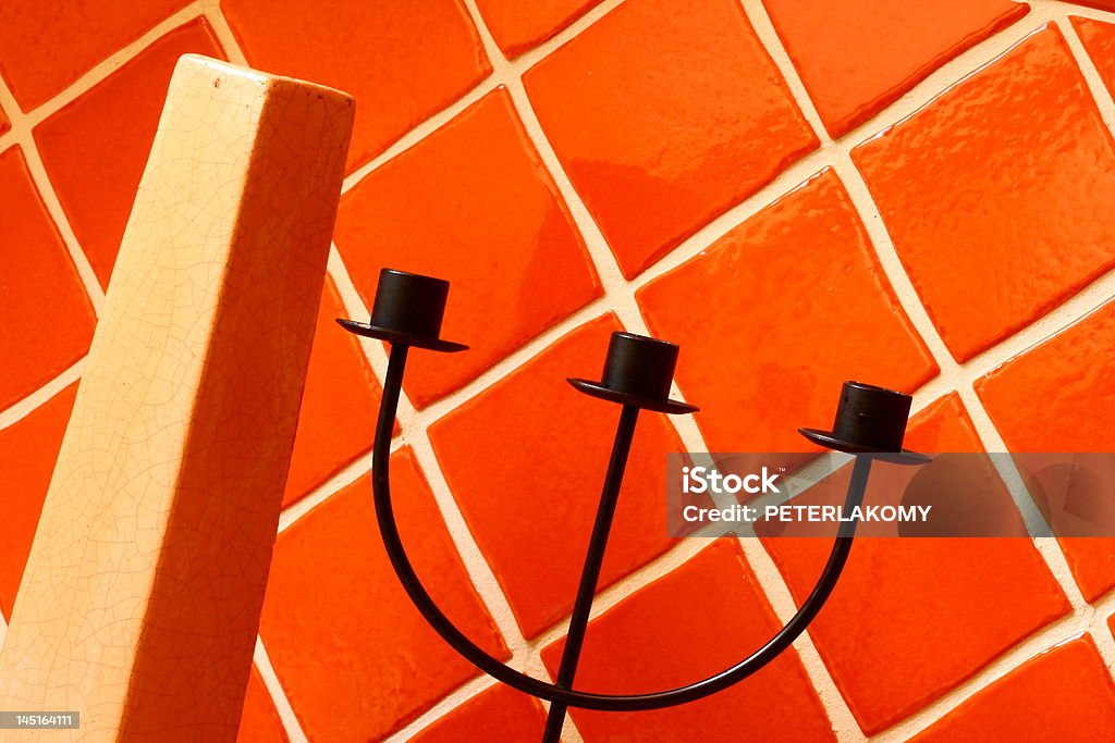 vase and candle stick vase and candle stick on ceramic wall Abstract Stock Photo