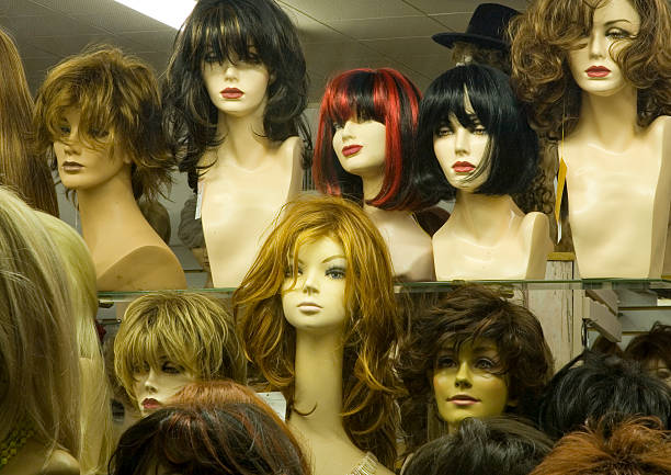 istock Various mannequin heads with wigs on in a wig store 145164356
