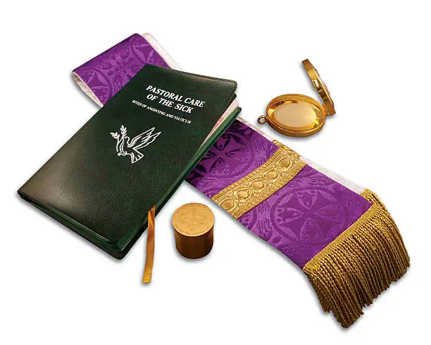 A collection of the items a catholic priest would use to perform the last rites.