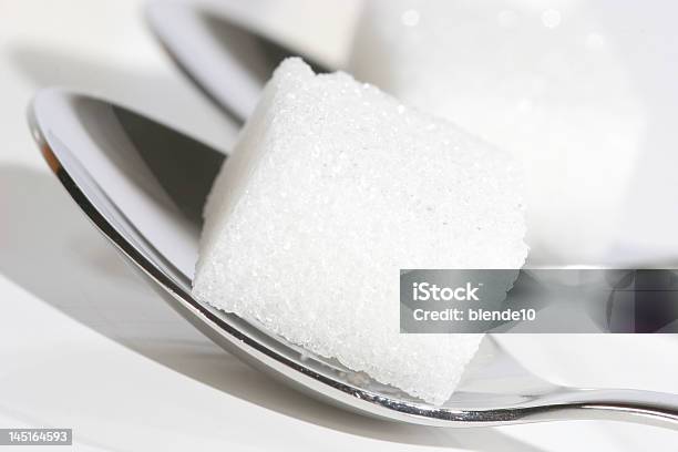 Sugar Cubes On Spoons Stock Photo - Download Image Now - Cube Shape, Cut Out, Food
