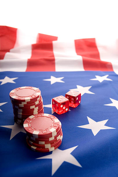 Red casino dice and gambling chips stock photo