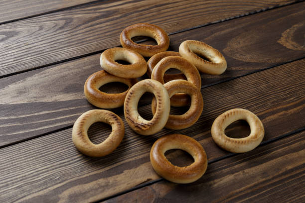 istock bagels on a wooden table. delicious dessert. 1451653141