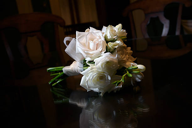 istock Bridal bouquet on wood table 145165507