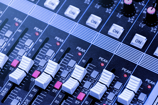 Close up scroll bar button control sound board mixer