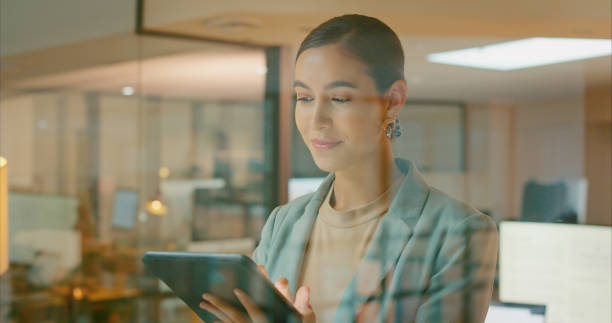istock Creative startup or business woman with tablet in office for data analysis, marketing strategy research or information technology. Happy, digital or employee networking or SEO software app update 1451668723