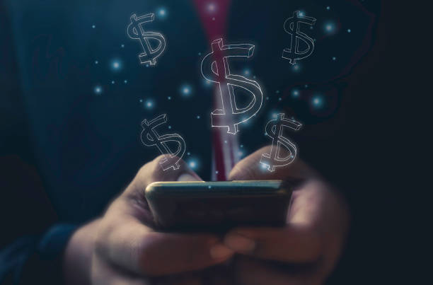 istock Hand use mobile phone and dollar symbol.Data in the businet and Digital technology 1451670717