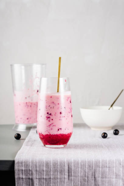 istock Blackcurrant smoothie with natural yogurt. 1451682346