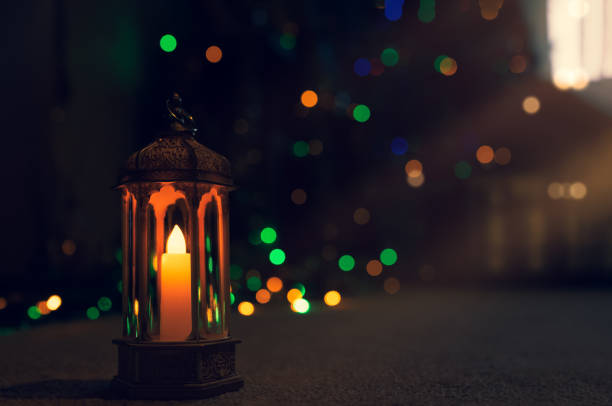 Ramadan Kareem Mubarak greeting design with islamic Lantern on carpet with blurry light background. Religion of Muslim Symbolic,Eid ul fitr,Eid al Adha,Eid el kabir,Islamic new year Muharram