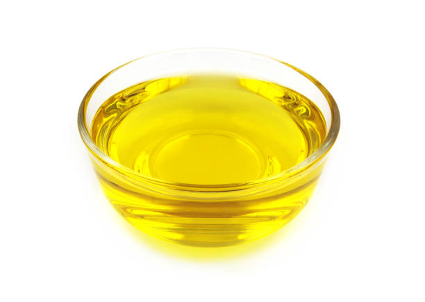 istock Cooking oil in bowl isolated on white 1451694677