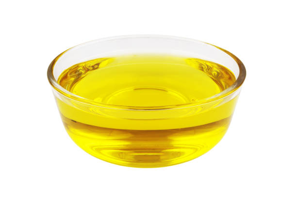 istock Bowl with cooking oil in bowl isolated on white 1451694697