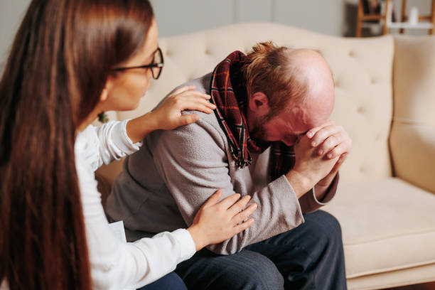 istock an american bald old man a psychologist at a clinic 1451696500
