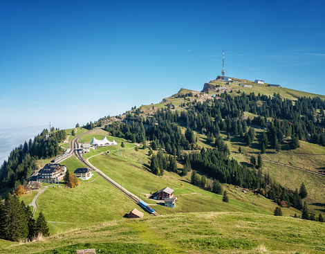 Tourists can reach mountain peak Rigi easily by taking the railway train from Lucerne, Switzerland. The area is also a beautiful hiking area.