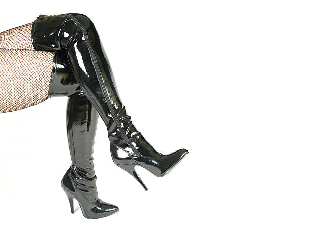 Fishnets and Boots Stiletto boots and Fishnet stockings dominatrix stock pictures, royalty-free photos & images