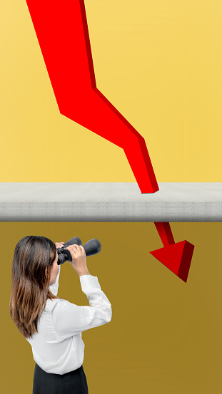Asian businesswomen with binoculars looking at decreasing arrows on a colored background