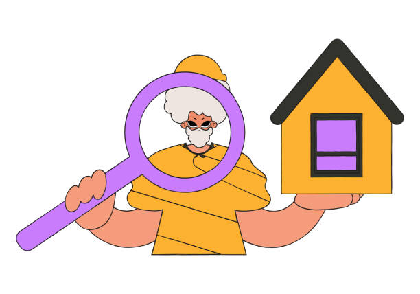 istock Male real estate agent holding a house and a magnifying glass. Home ownership. 1451706579