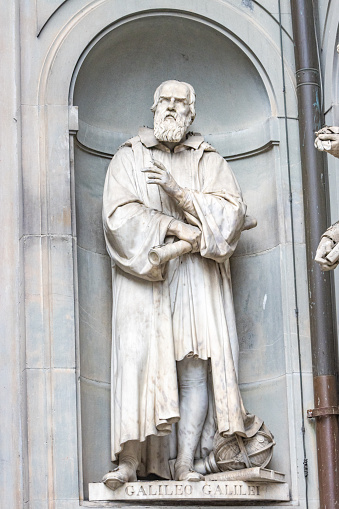 Galileo Galilei (1564-1642) sculpture in the public square known as Niches of the Colonnade. It was sculpted by Aristodemo Costoli in the 19th century. Galileo di Vincenzo Bonaiuti de' Galilei was an astronomer, physicist and engineer.