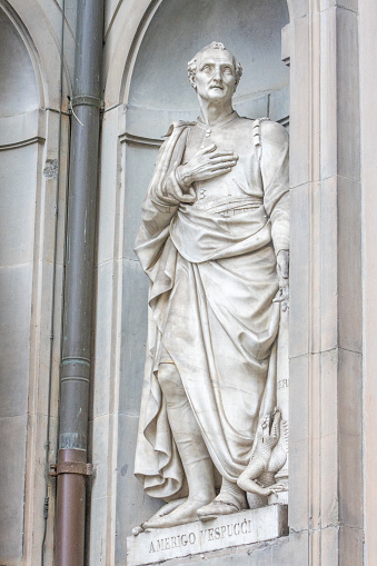 Sculpture of Amerigo Vespucci (1454-1512) by Gaetano Grazzini in the 19th century. Located in the public square called Niches of the Colonnade. Vespucci gave his name to 'America' and was an explorer and navigator.