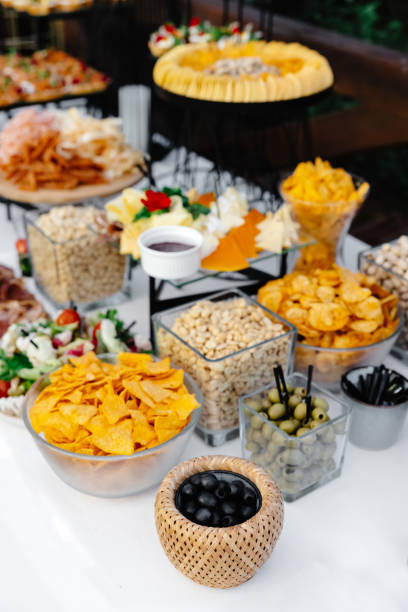 istock Buffet table of reception with cold snacks, meat and salads 1451722979