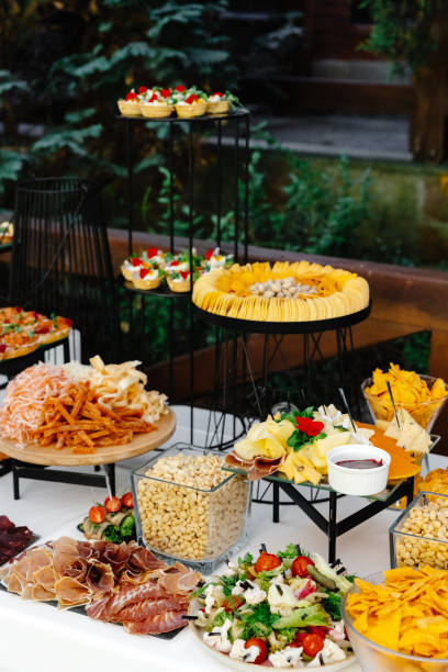 istock Buffet table of reception with cold snacks, meat and salads 1451722984