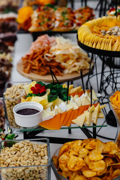 istock Buffet table of reception with cold snacks, meat and salads 1451723086