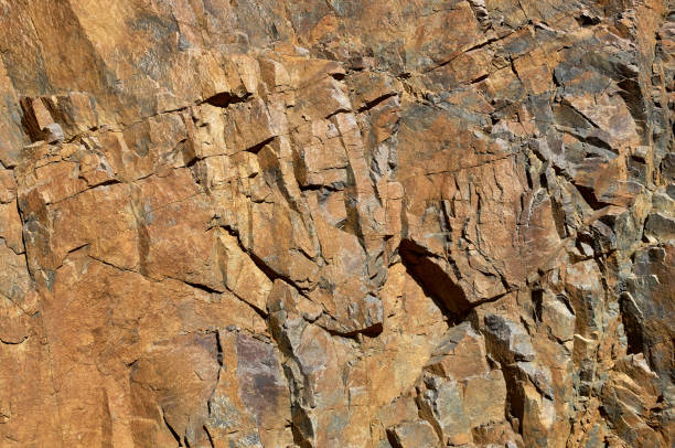istock Close-up of yellow rough natural mountain texture 1451733546
