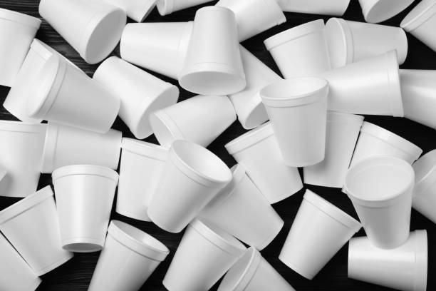 istock Many white styrofoam cups on black wooden table, flat lay 1451734201