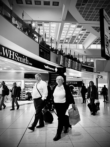 People in the busy airport terminal at Gatwick Airport Terminal North. Captured during the Christmas period on the 22nd December 2022