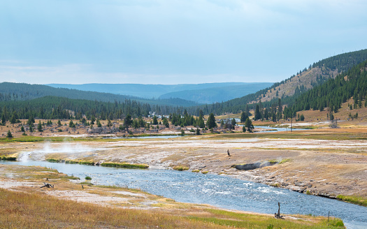 Panoramic view of Yellowstone National Park, Firehole River, at the area of Upper Geyser Basin. Yellowstone National Park, Wyoming, USA.